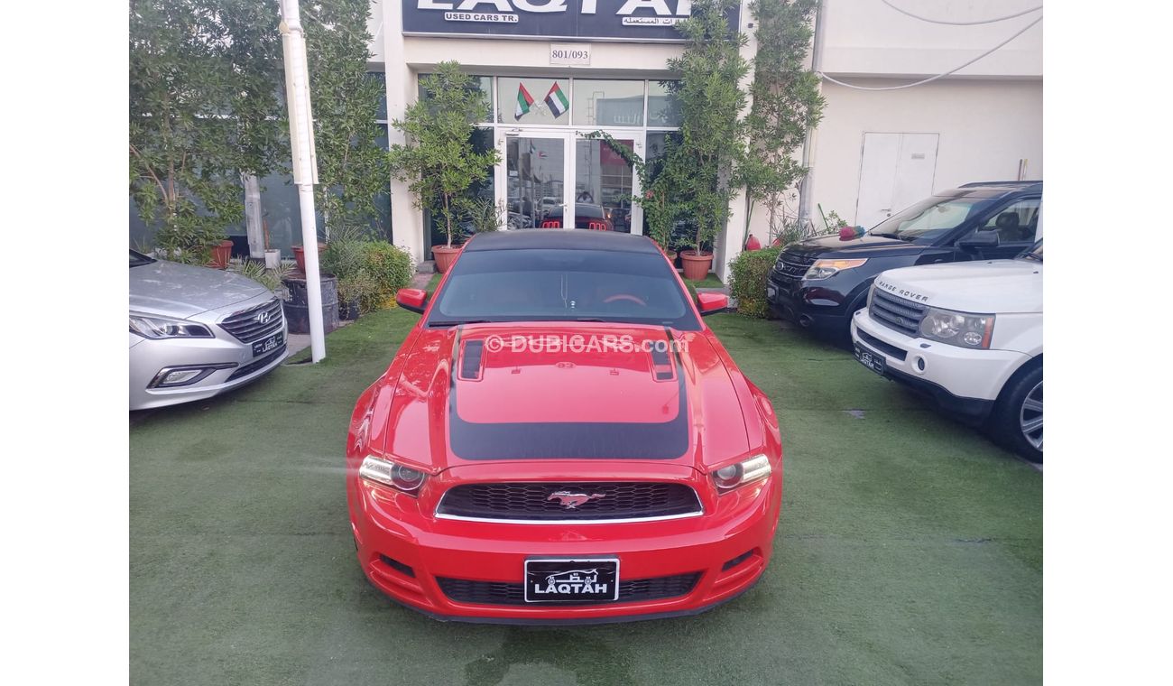 Ford Mustang 2014 GCC model, coupe, cruise control, rear camera, leather rear spoiler, in excellent condition
