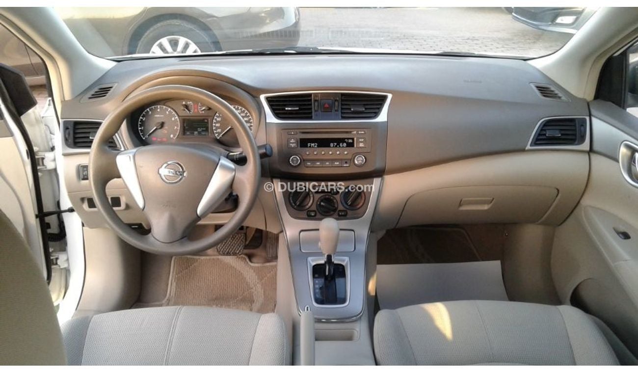 Nissan Sentra 2015 white 1.8 Gcc Excellent Condition without Accidents