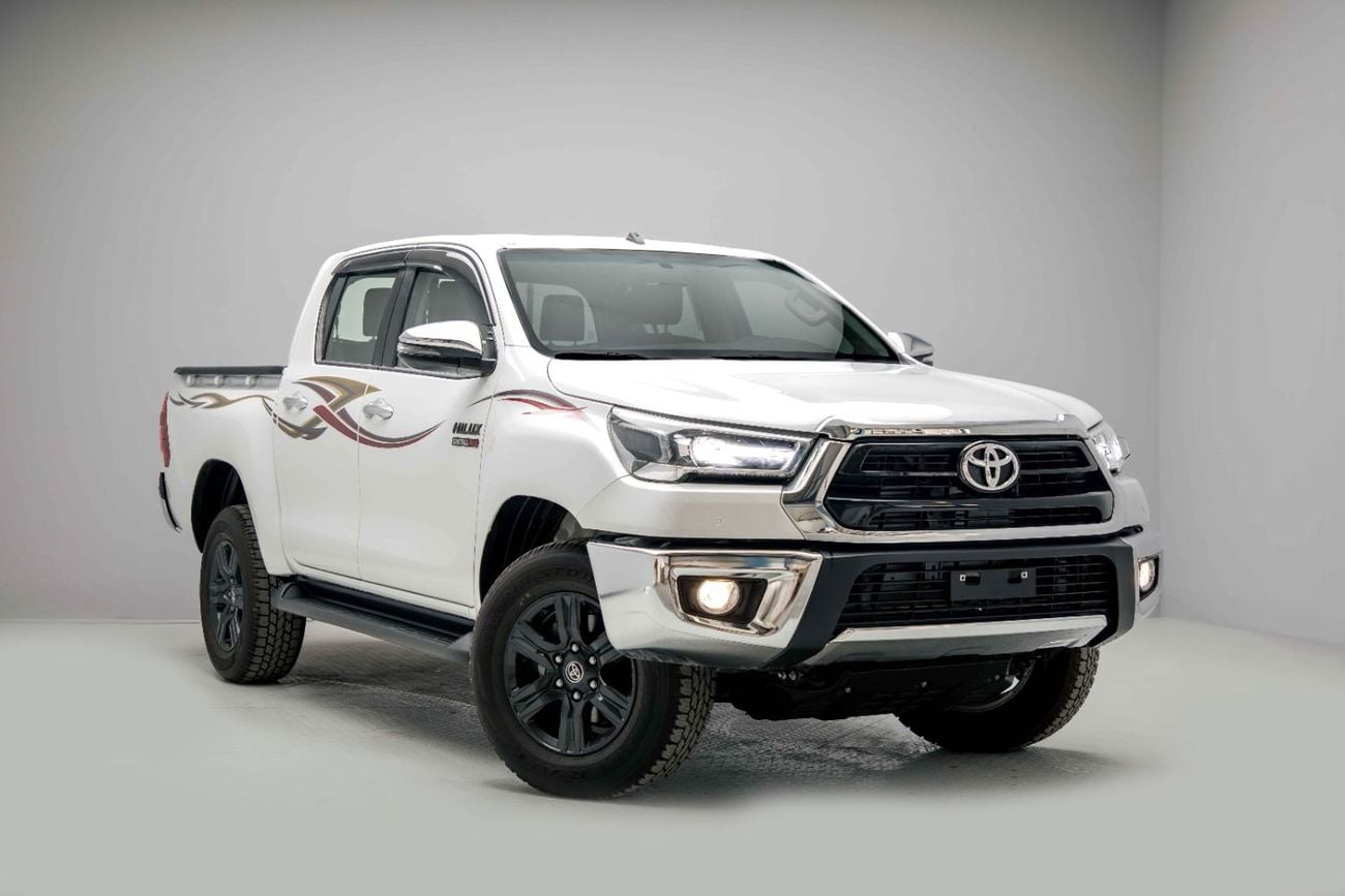 Toyota Hilux 2.4L - Platinum White Inside Maroon | Export Only