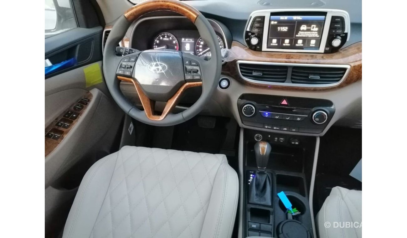 Hyundai Tucson 2.0  with leather seat ,electric seat