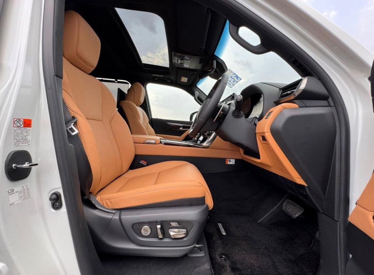 Lexus LX600 Lexus LX 600 twin turbo Model 2025 fuel petrol cylinder 6 white colour outside and interior orange