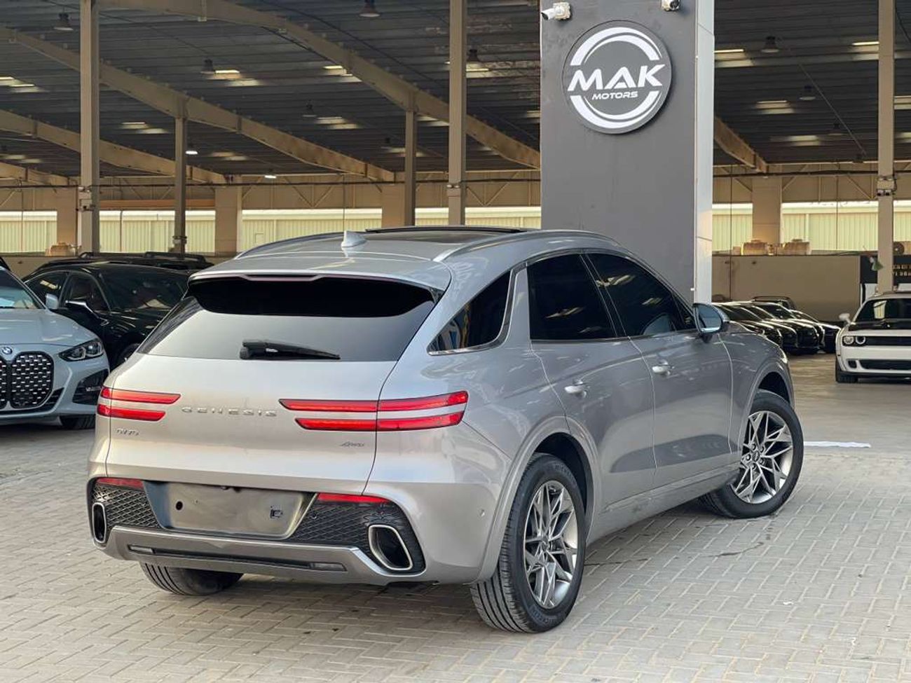 جينيسس GV70 / دفع رباعي / فتحة سقف بانورامية / كاميرا 360 درجة / مسافة منخفضة / بحالة ممتازة