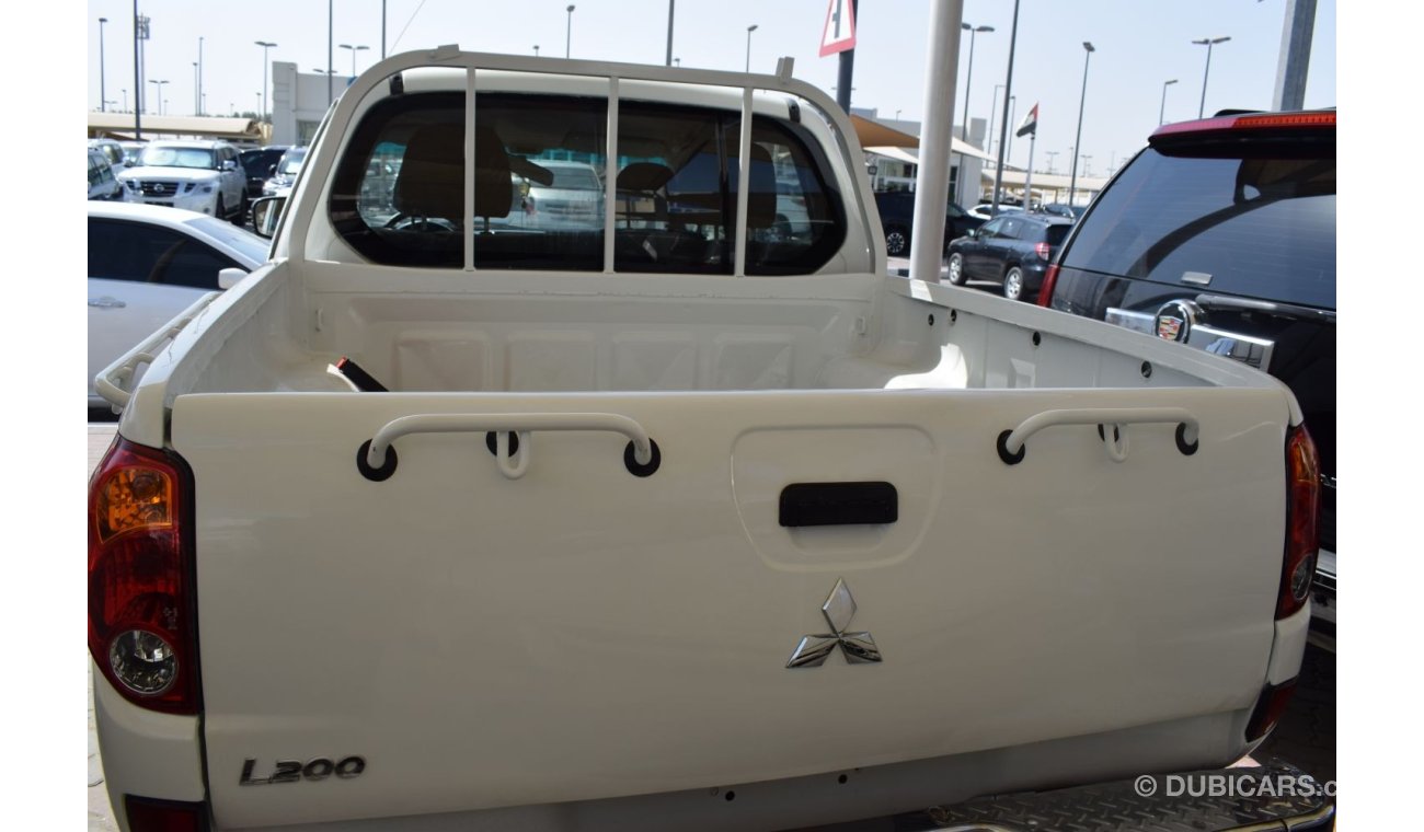 ميتسوبيشي L200 Mitsubishi L200 d/c pick up 4x4,model:2013.Excellent condition