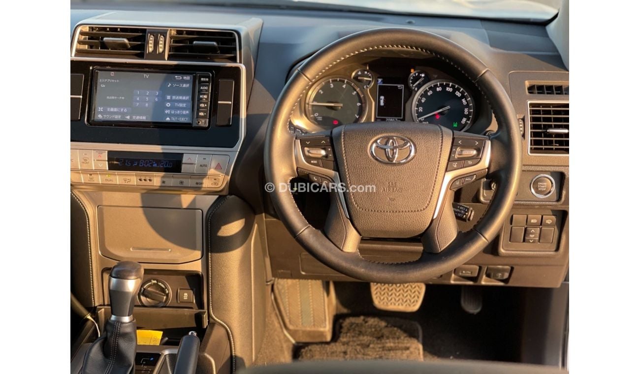 Toyota Prado Toyota prado Petrol  engine 2.7 model 2018 from japan white color 7 seater car very clean and good c