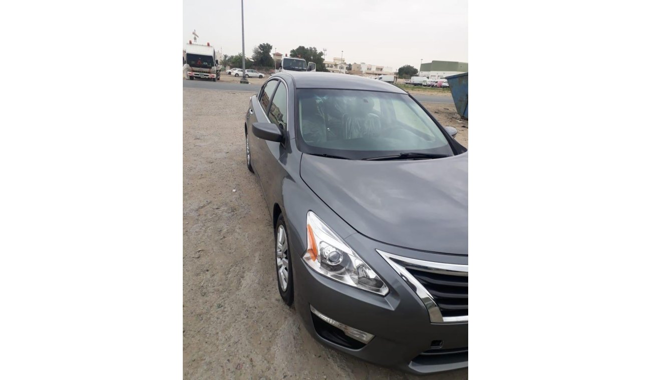 Nissan Altima 2014 For Urgent SALE Passing gurantee from RTA Dubai