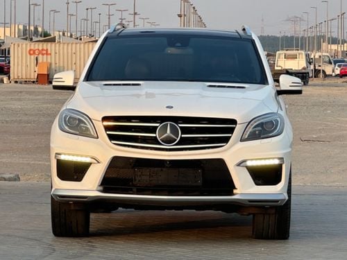 مرسيدس بنز ML 63 AMG موديل 2015 حاله ممتازه صبغ وكاله بالكامل فل مواصفات بانوراما وردار