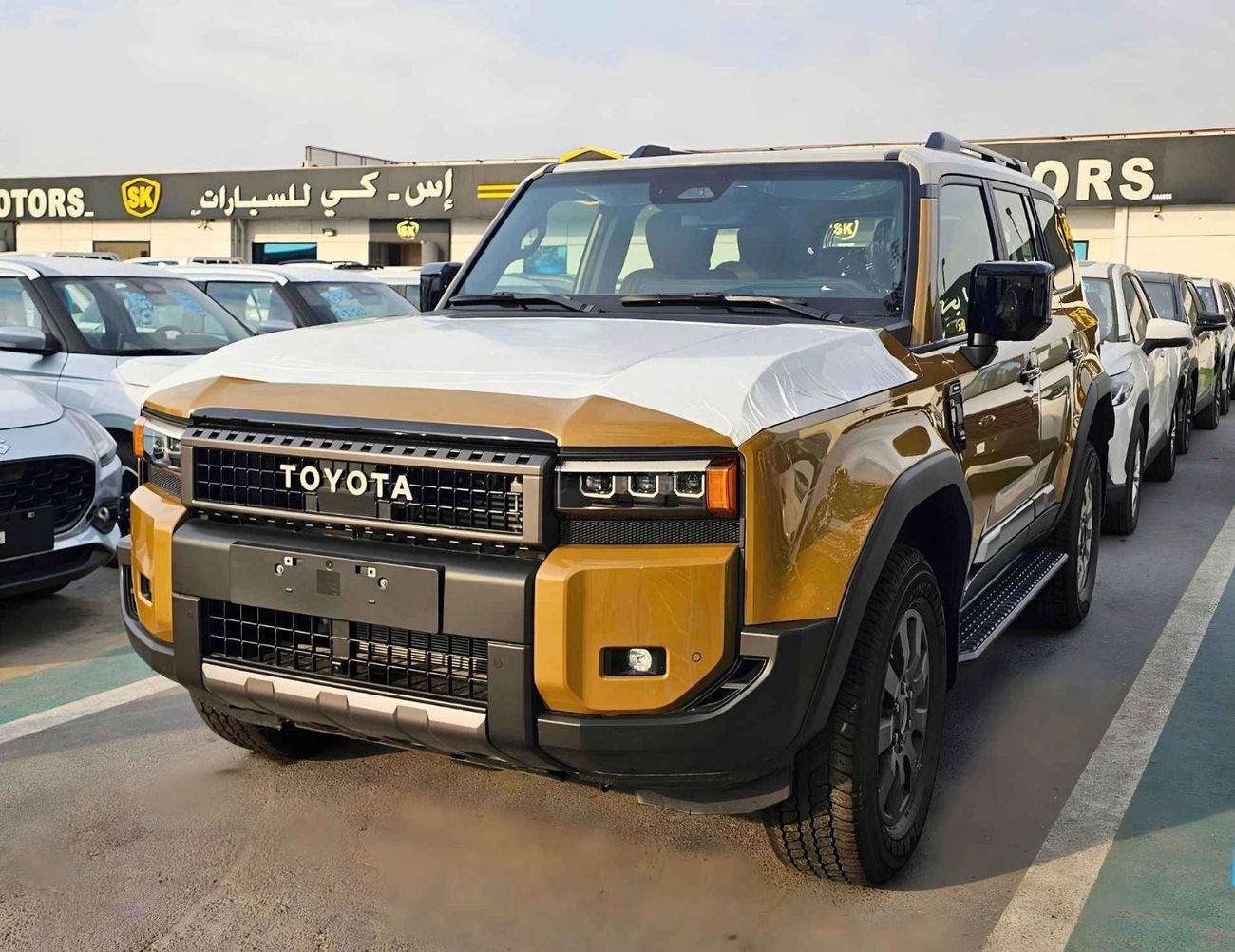 تويوتا برادو TURBO ADVENTURE DUAL TONE / 2.4L PETROL A/T V4 / HIGH OPTION WITH RADAR / (CODE#PPADV)