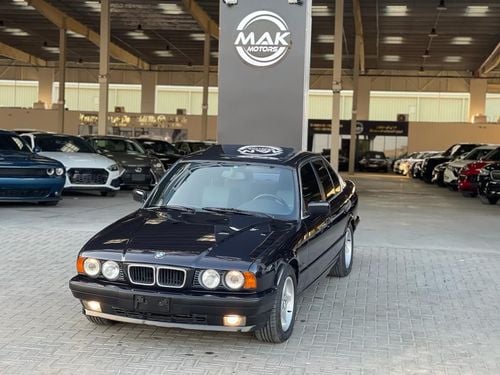 BMW 525 BMW 525i موديل 1995 ماشي 64000 كم  وارد اليايان  مواصفات خاصة اندفيجوال فول اوبشن كامل ( فتحة _ جلد