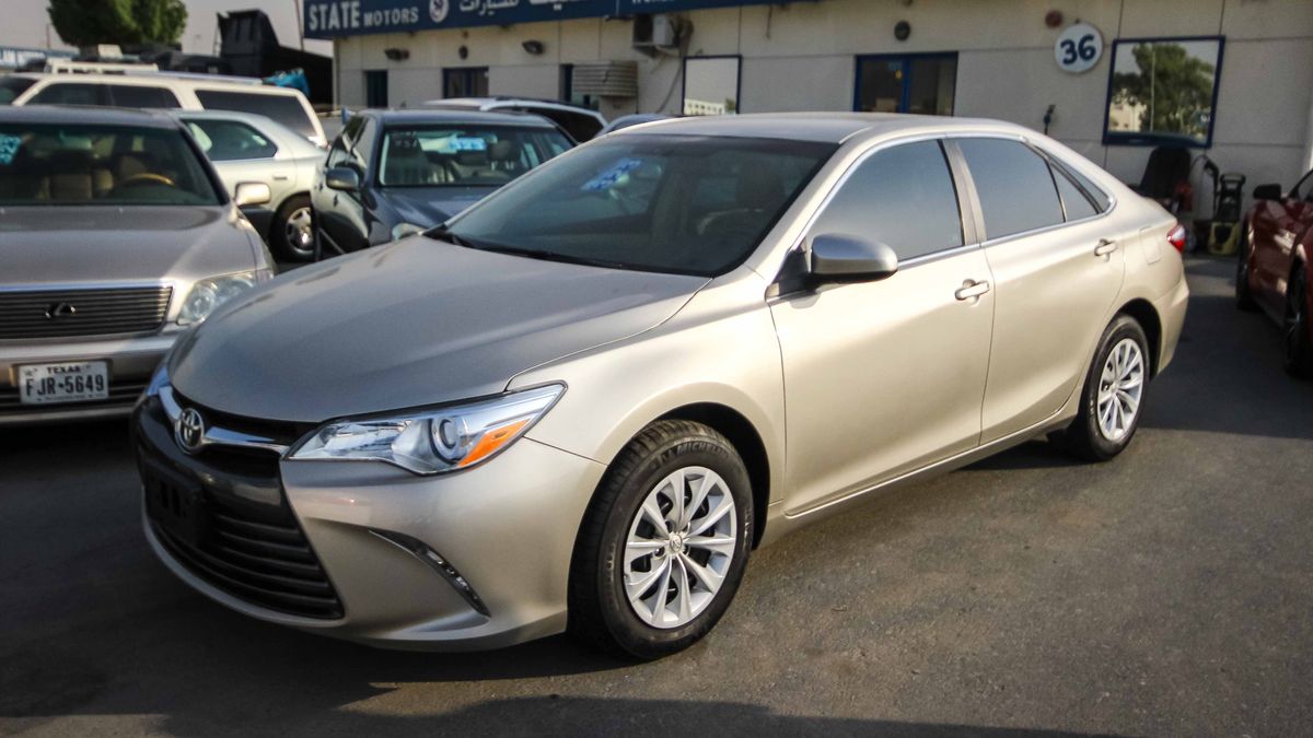 Toyota Camry LE for sale: AED 45,000. Gold, 2015