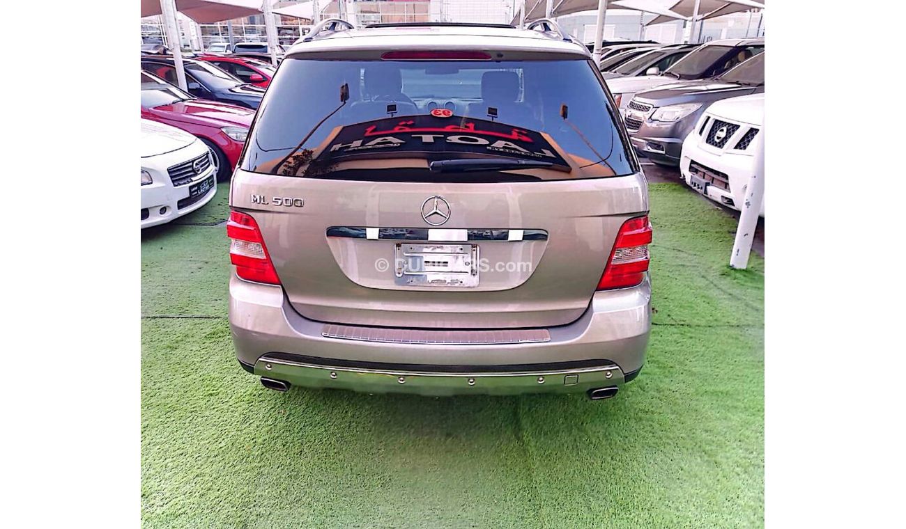 مرسيدس بنز ML 500 وارد موديل 2006 لون ذهبى رقم واحد فتحة جلد رنجات بحالة ممتازة لاتحتاج لأى مصاريف