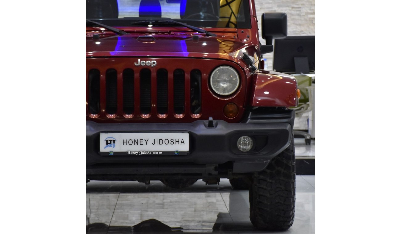 جيب رانجلر EXCELLENT DEAL for our Jeep Wrangler Unlimited SAHARA ( 2012 Model ) in Maroon Color GCC Specs
