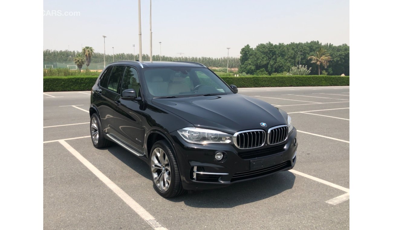 بي أم دبليو X5 50i لاكجري موديل 2014 خليجي فل مواصفات كراسي جلد ومثبت سرعه وتحكم كهربي كامل ونظام صوت ممتاز وكاميرا