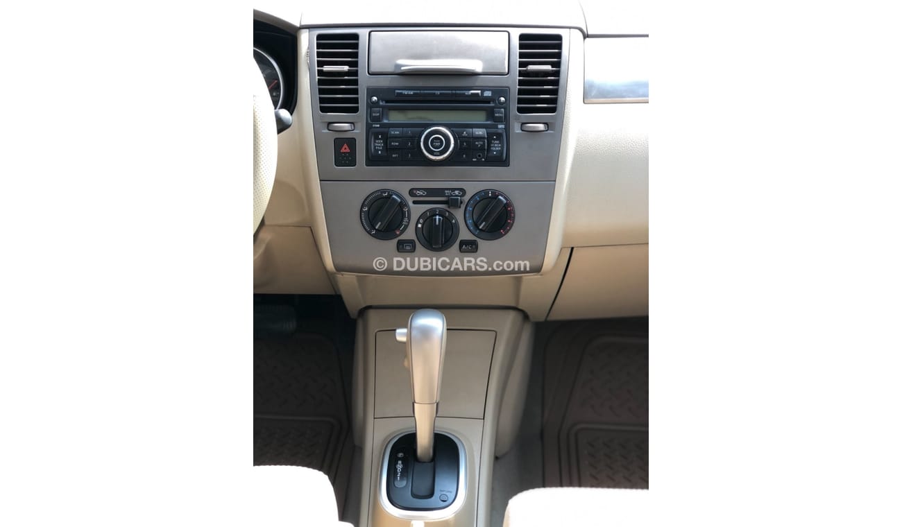 نيسان تيدا موديل 2012 خليجي فل مواصفات فتحه سقف مالك واحد من الوكاله مفتاحين فل مواصفات فتحه سقف