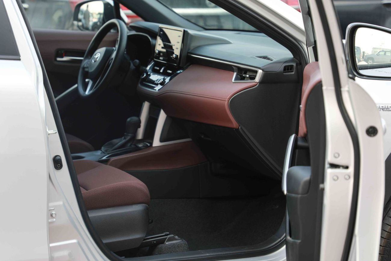 تويوتا كورولا كروس 1.8 Hybrid MID - Silver inside Red | Export Only