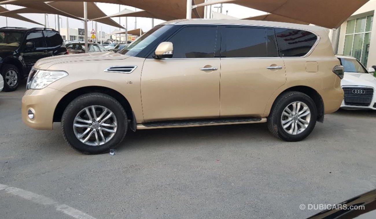 نيسان باترول 2011 Se full options clean car sunroof  gcc specs 3 dvd