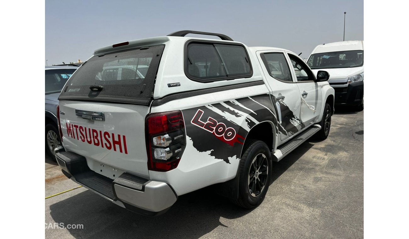 ميتسوبيشي L200 Euro4 / 2.4L Diesel. M/T Carry Body. Full Option with Black Rims.(CODE # MPL2)