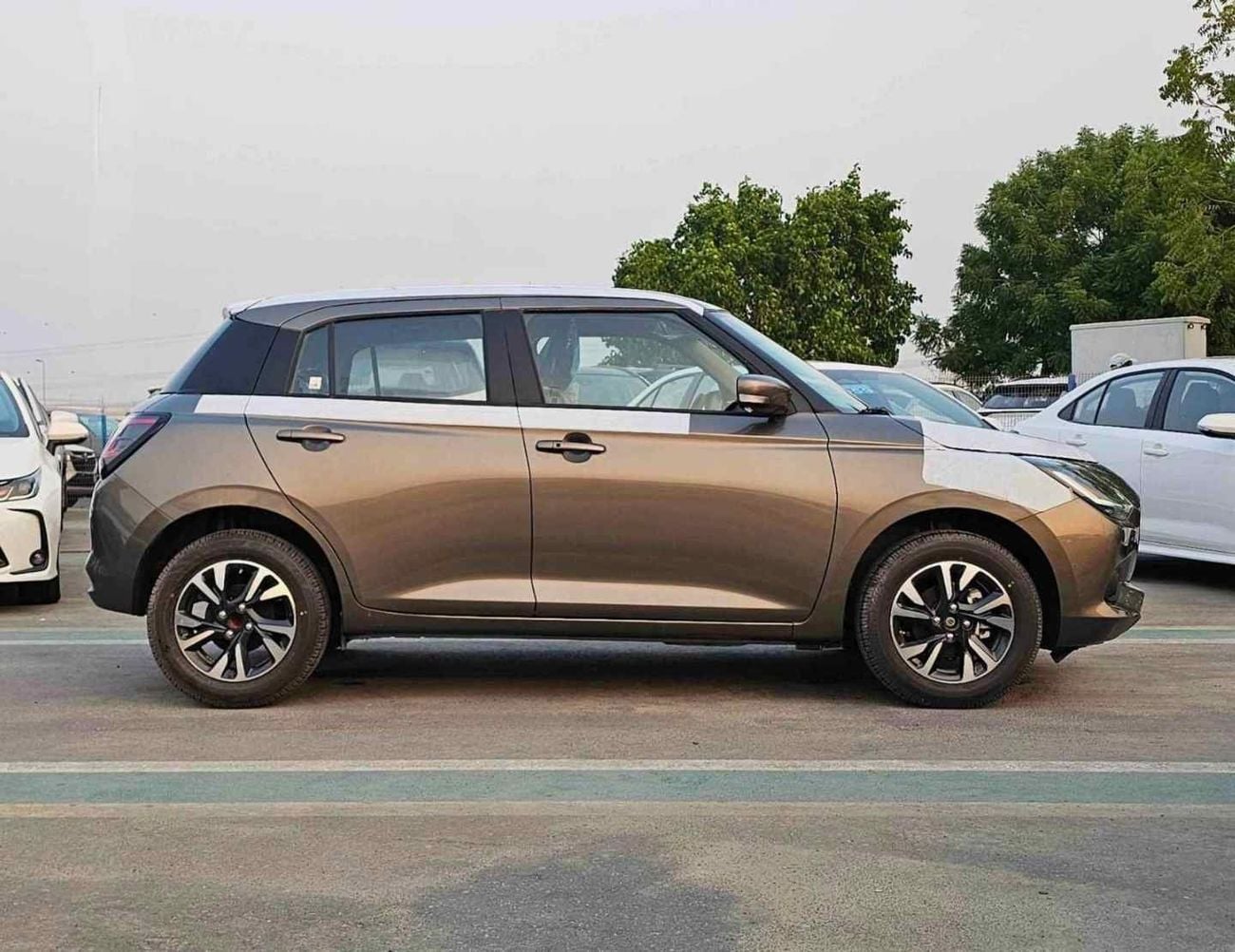 سوزوكي سويفت GLX SUZUKI SWIFT GLX HYBRID || RADAR | PETROL AT 1.2L V4 (CODE # SWGLXFOH) GRAY 2026