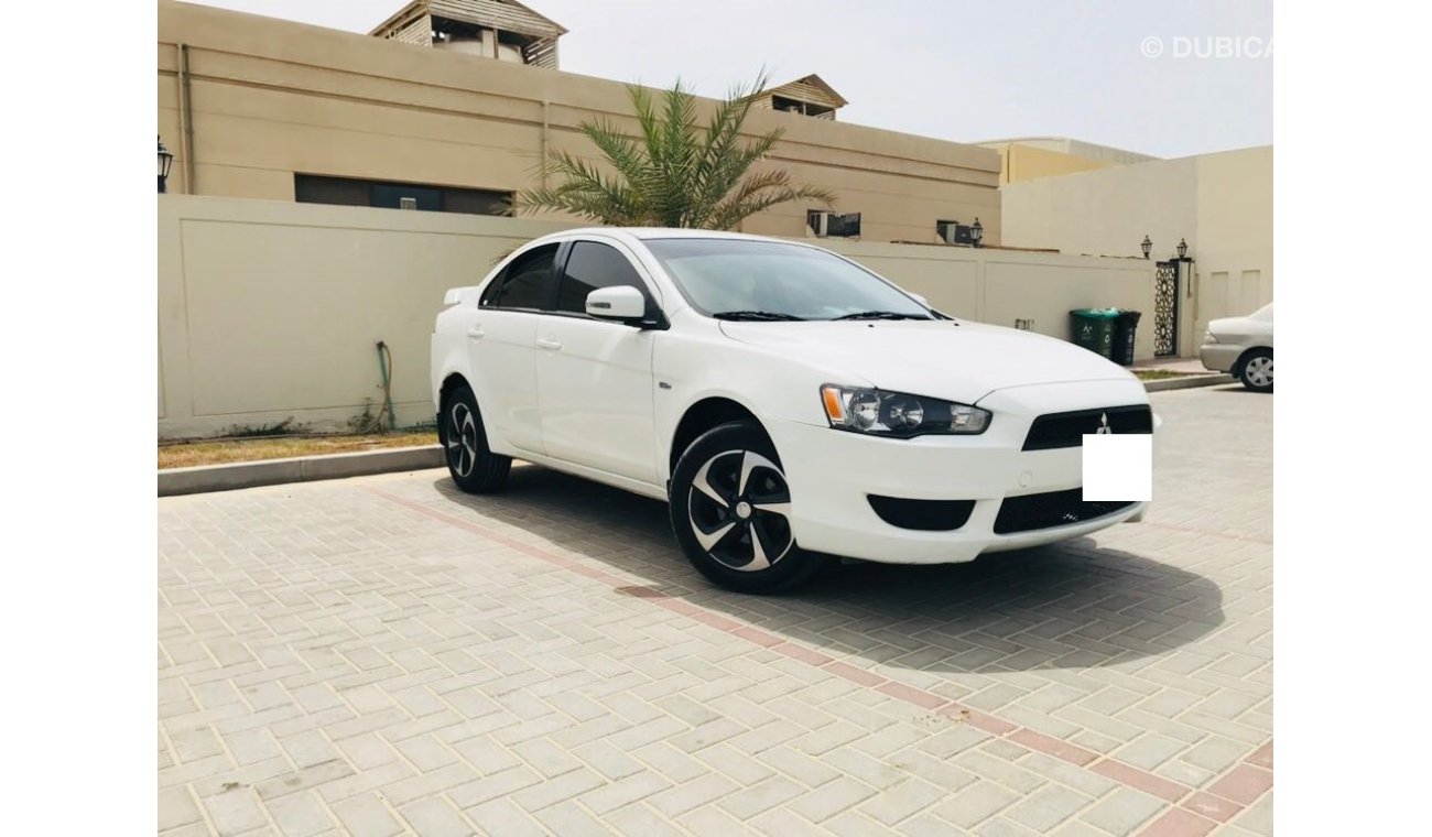 Mitsubishi Lancer 2.0 EMI 520X 60 ,0% DOWN PAYMENT , MINT CONDITION Dubai > Motors > Used Cars for Sale > Mitsubishi >