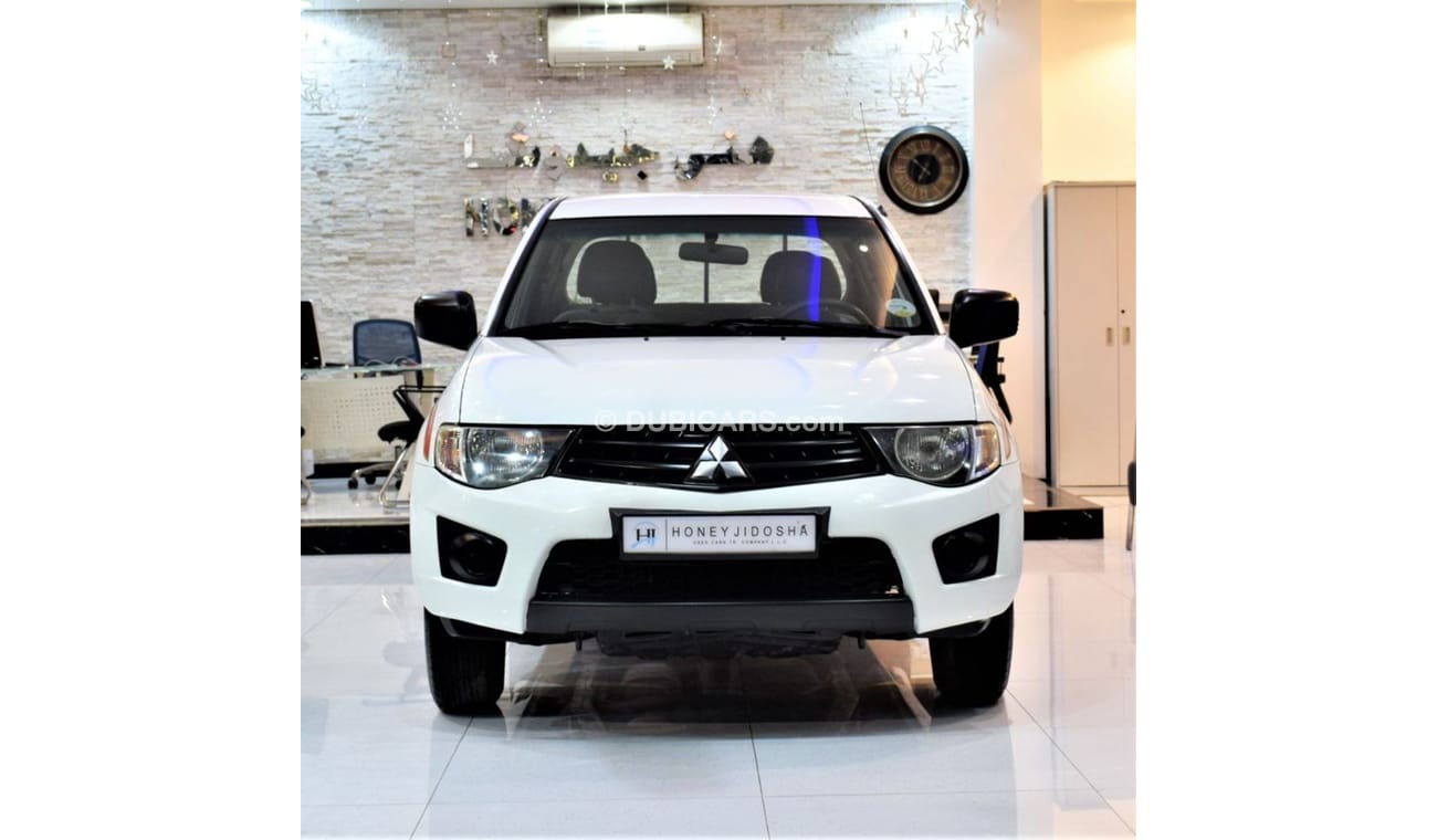 Mitsubishi L200 PERFECT FOR TRANSPORTING ITEMS! Mitsubishi L200 2013 Model!! in White Color! GCC Specs