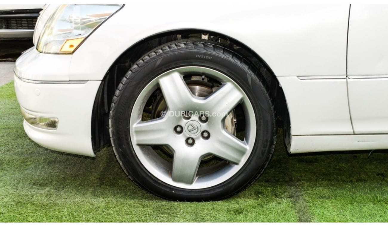 Lexus LS 430 Imported 1/2 Ultra, model 2006, white color, leather opening, wooden wheels, electric mirrors, excel