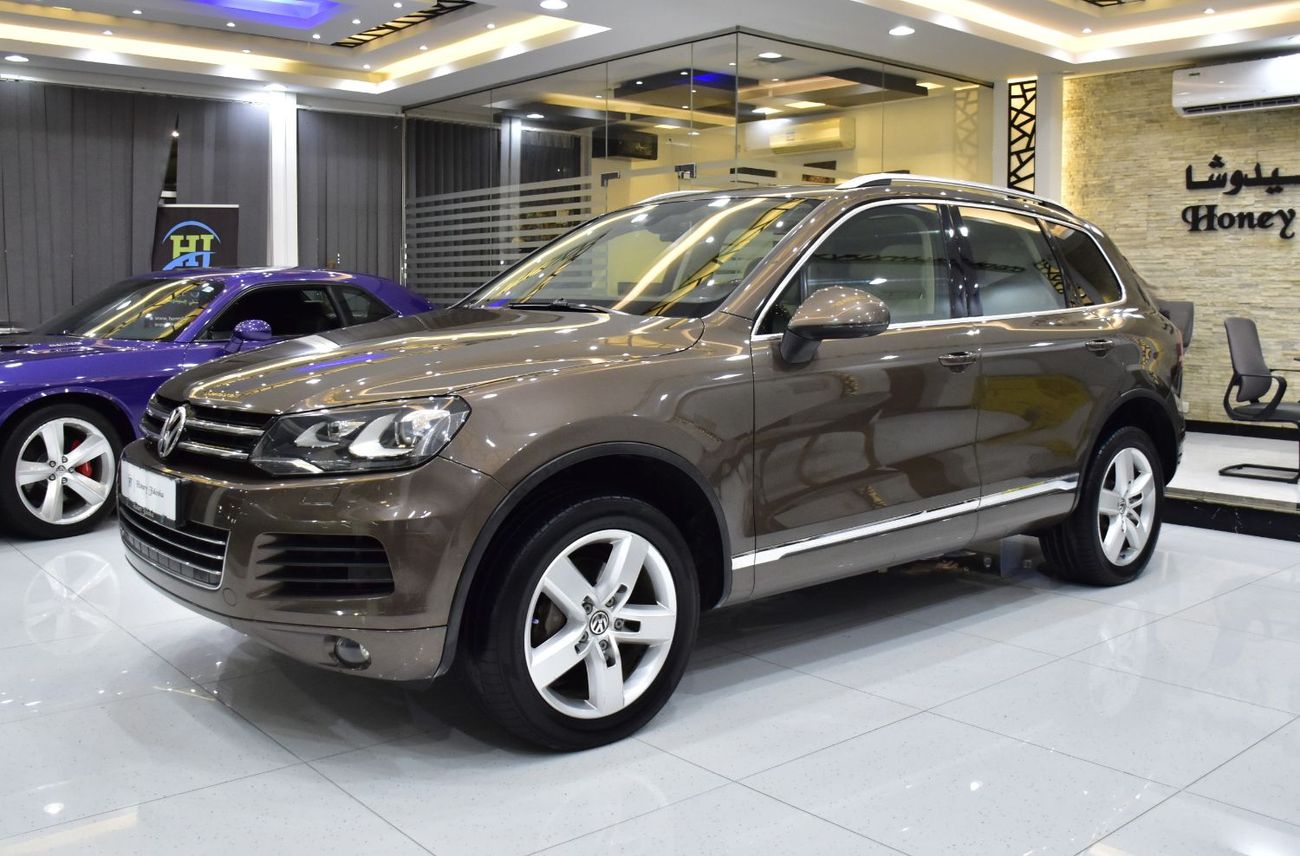 Volkswagen Touareg SEL EXCELLENT DEAL for our Volkswagen Touareg ( 2015 Model ) in Brown Color GCC Specs
