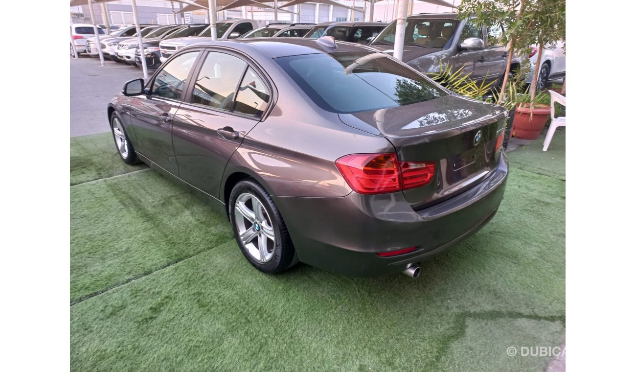 BMW 316i Model 2013 Gulf Brown BM316i color Cruise control, wheels control in excellent conditiona