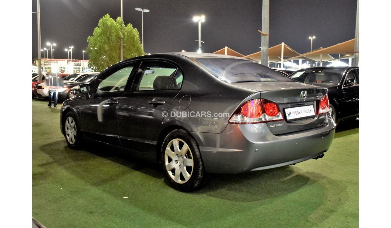 Honda Civic EXCELLENT DEAL for our Honda Civic 1.8 i-VTEC ( 2009 Model ) in Grey Color GCC Specs