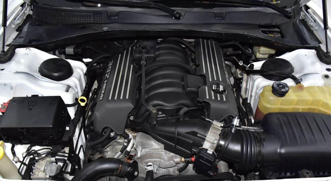 Dodge Charger SRT8 EXCELLENT DEAL for our Dodge Charger SRT ( 2015 Model ) in White Color GCC Specs