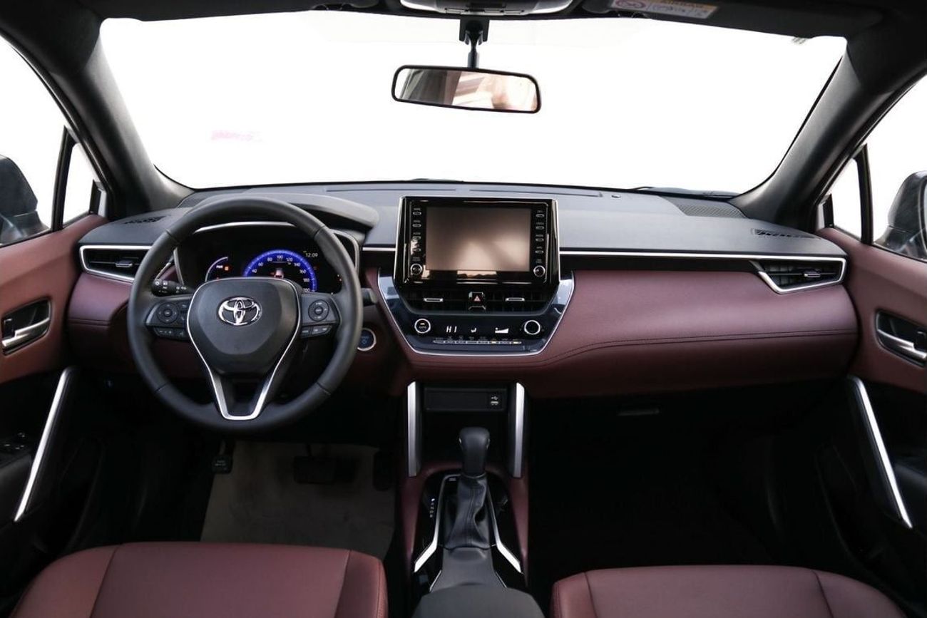 Toyota Corolla Cross Best offer for the new Corolla Cross Hybrid 2024 1.8L contact Now | Terra rosa color interior