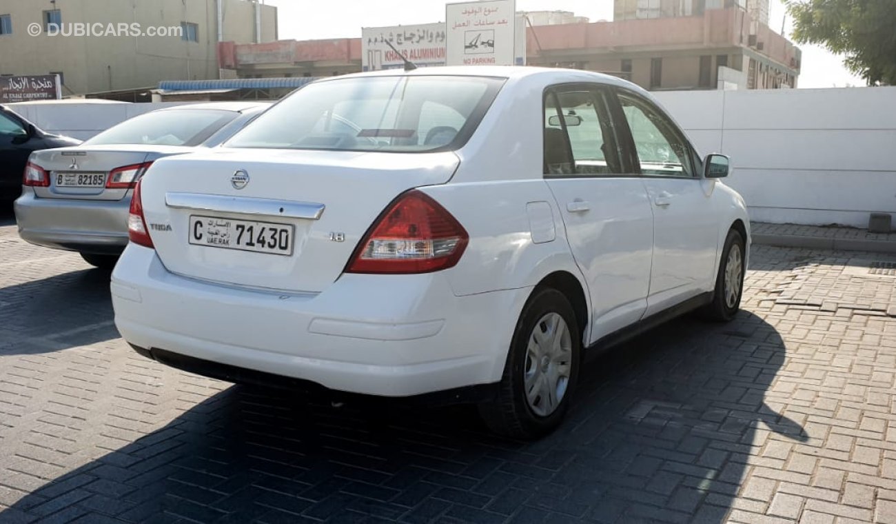 Nissan Tiida نيسان تيدا 1.8 موديل 2012 بحاله ممتازه لا تحتاج اي مصاريف ماشيه 130000