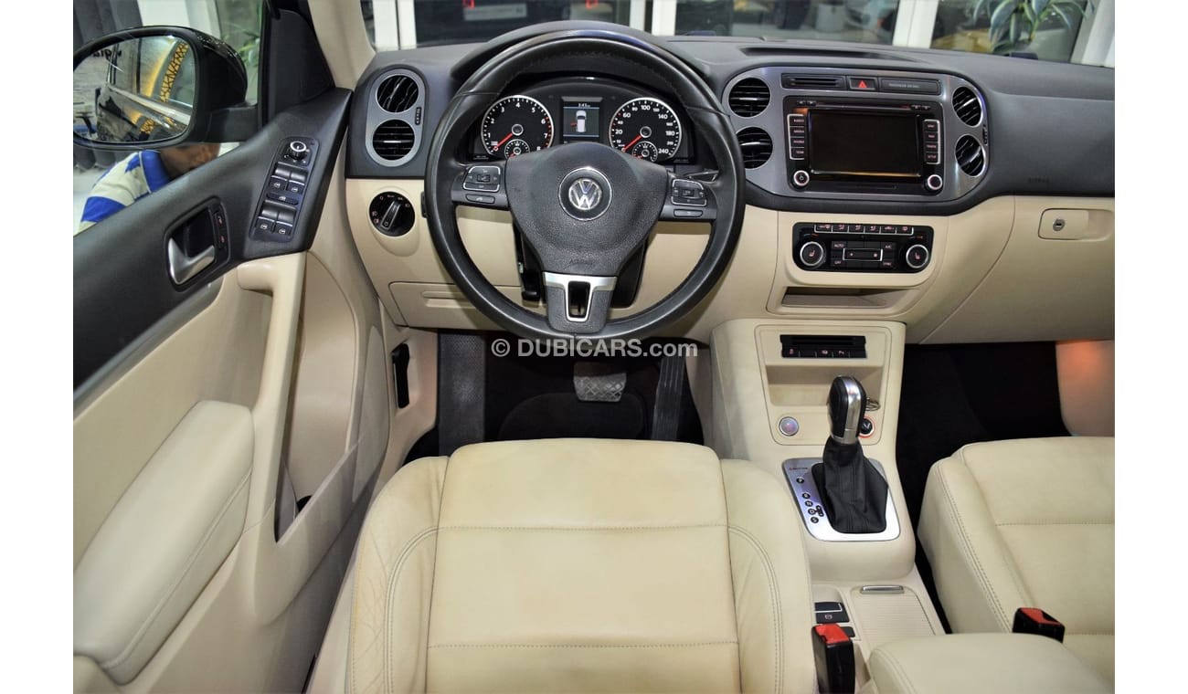 Volkswagen Tiguan SEL EXCELLENT DEAL for our Volkswagen Tiguan 2.0 TSi 4Motion ( 2014 Model! ) in Black Color! GCC Spe