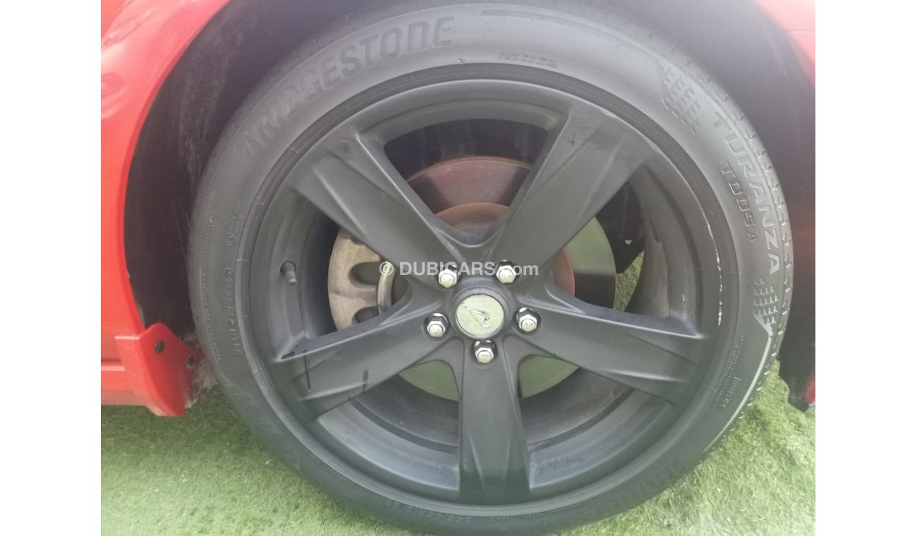 Ford Mustang 2014 GCC model, coupe, cruise control, rear camera, leather rear spoiler, in excellent condition