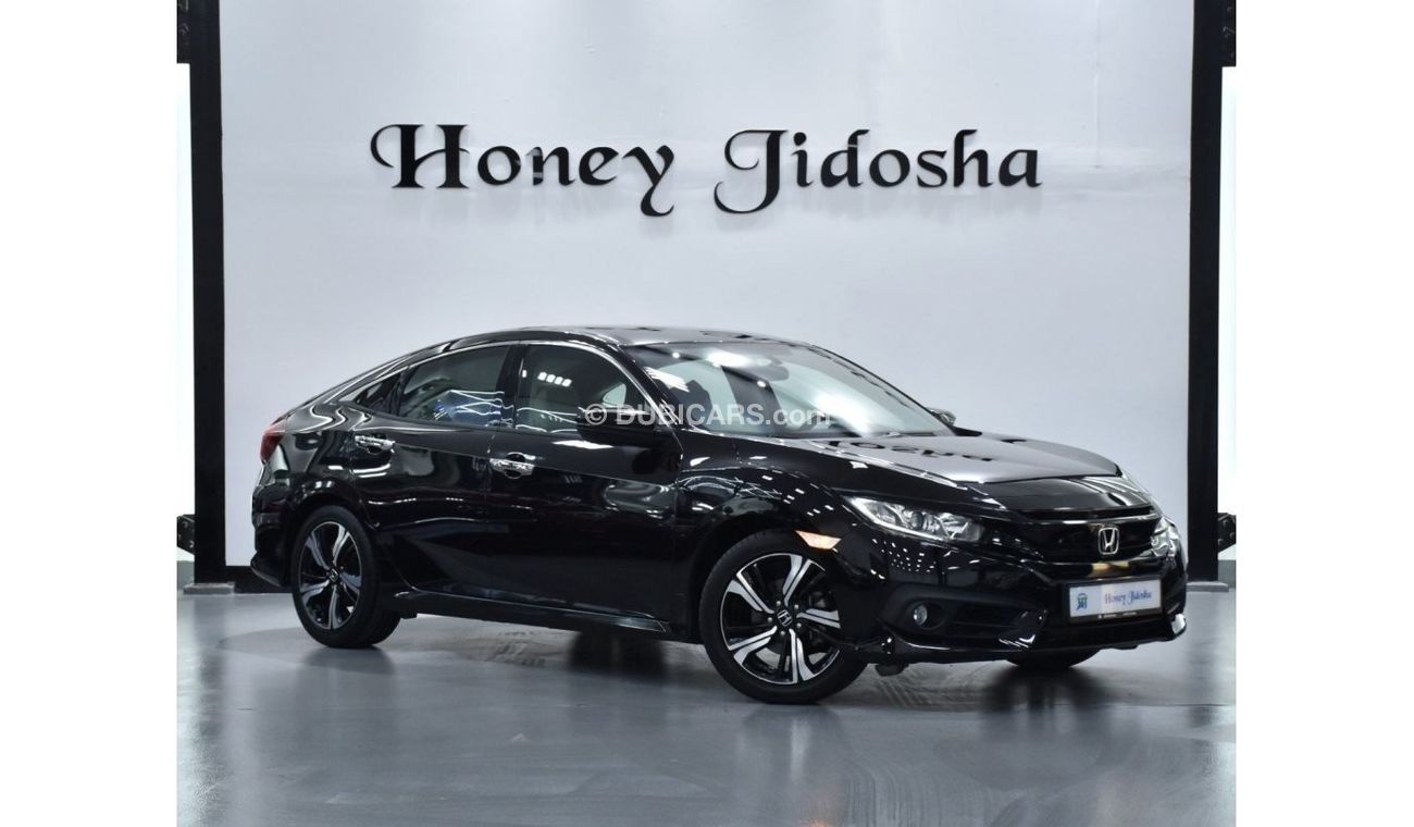 Honda Civic EXCELLENT DEAL for our Honda Civic ( 2019 Model ) in Dark Violet Color GCC Specs