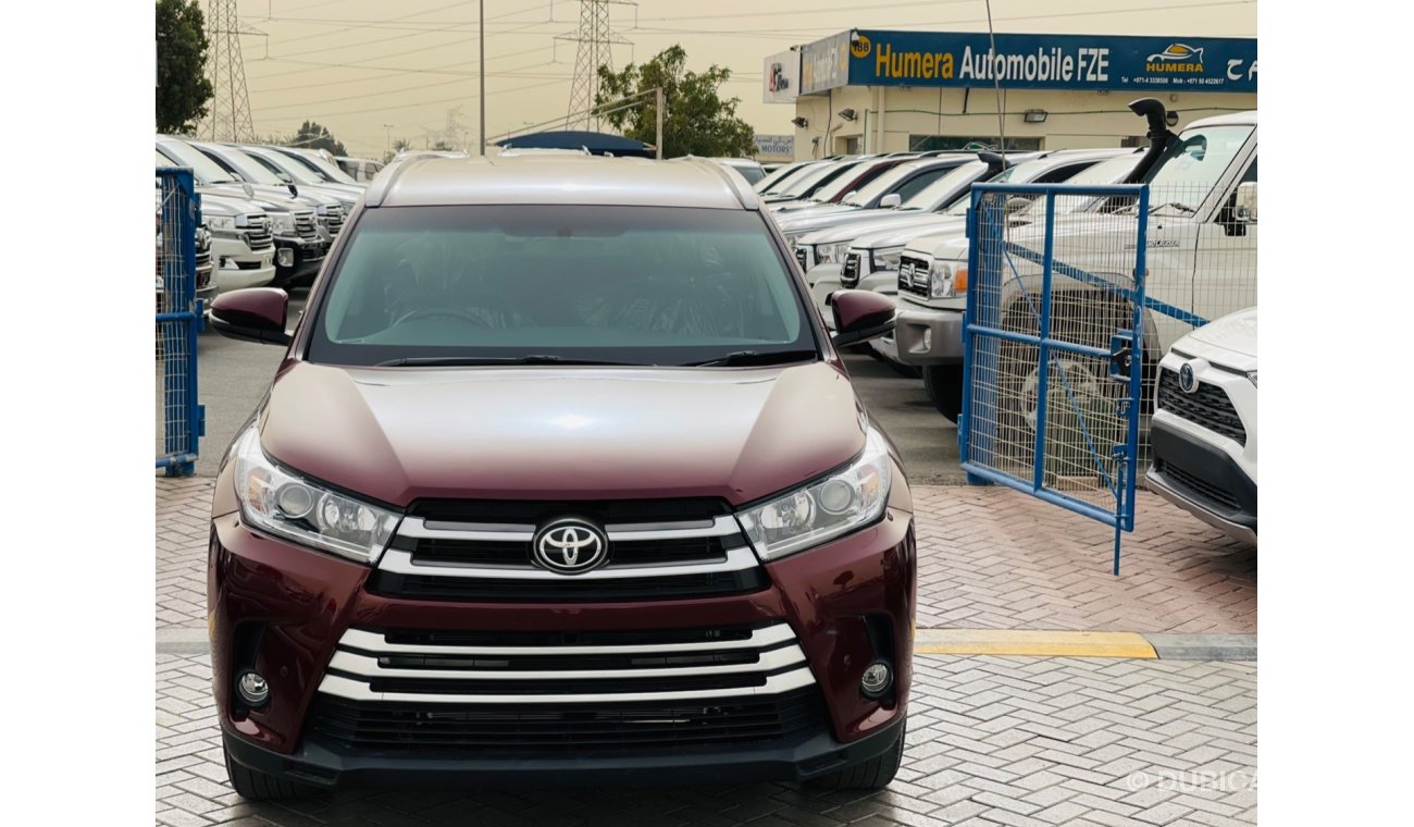 تويوتا كلوجير Toyota Kluger Petrol engine model FEB/2014 maroon color 7 seater  with push start and leather seats