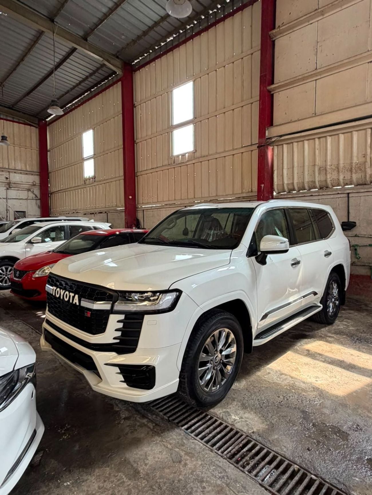 Toyota Land Cruiser GXR 2014Model Facelifted 2024 4.6L v8 petrol Engine Colour White push start Transmission Automatic Inter