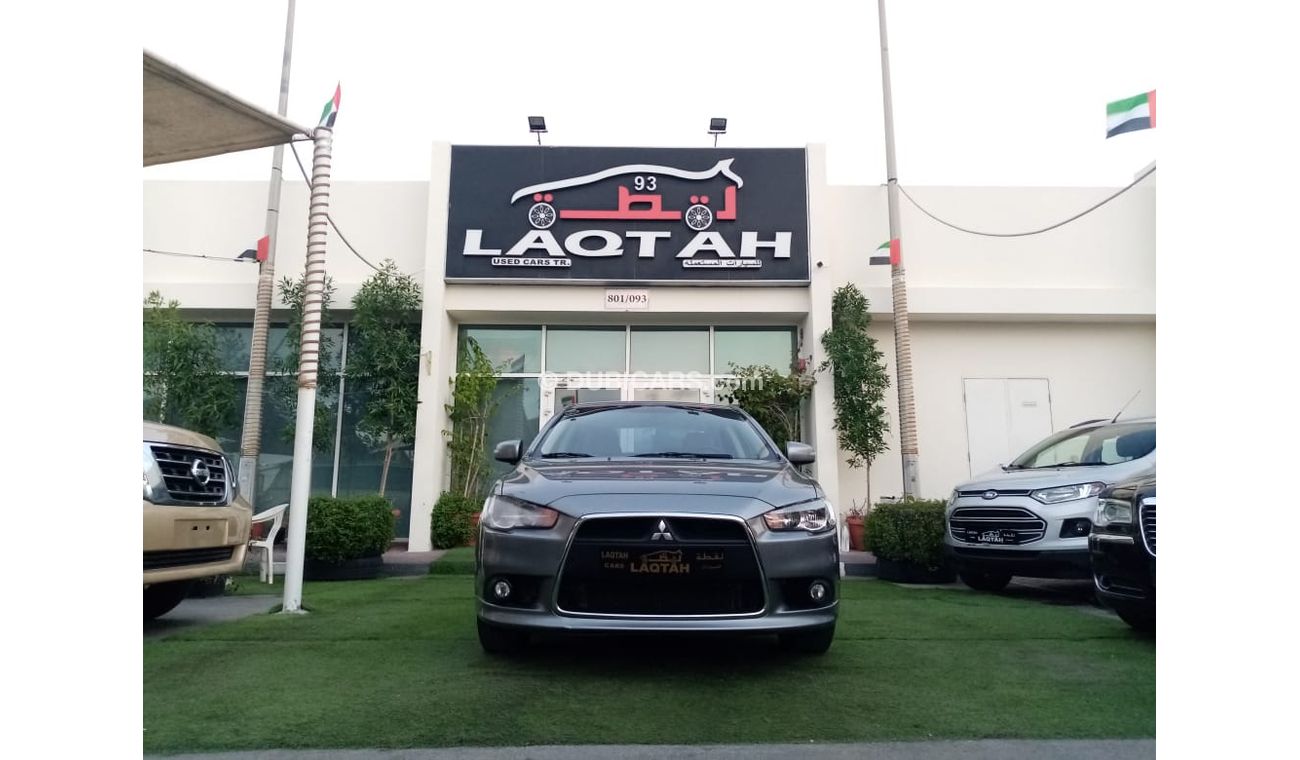 Mitsubishi Lancer Gulf gray color, inside beige without accidents, rear wing sensors, fog lights, in excellent conditi