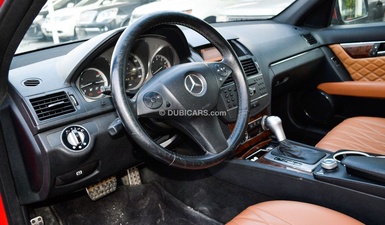 Mercedes Benz C300 C300 2009 model red color imported number one panorama leather and cruise control