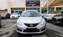 Nissan Tiida Pre-owned  for sale in Sharjah. Grey/Silver 2016 model, available at Wael Al Azzazi Shar