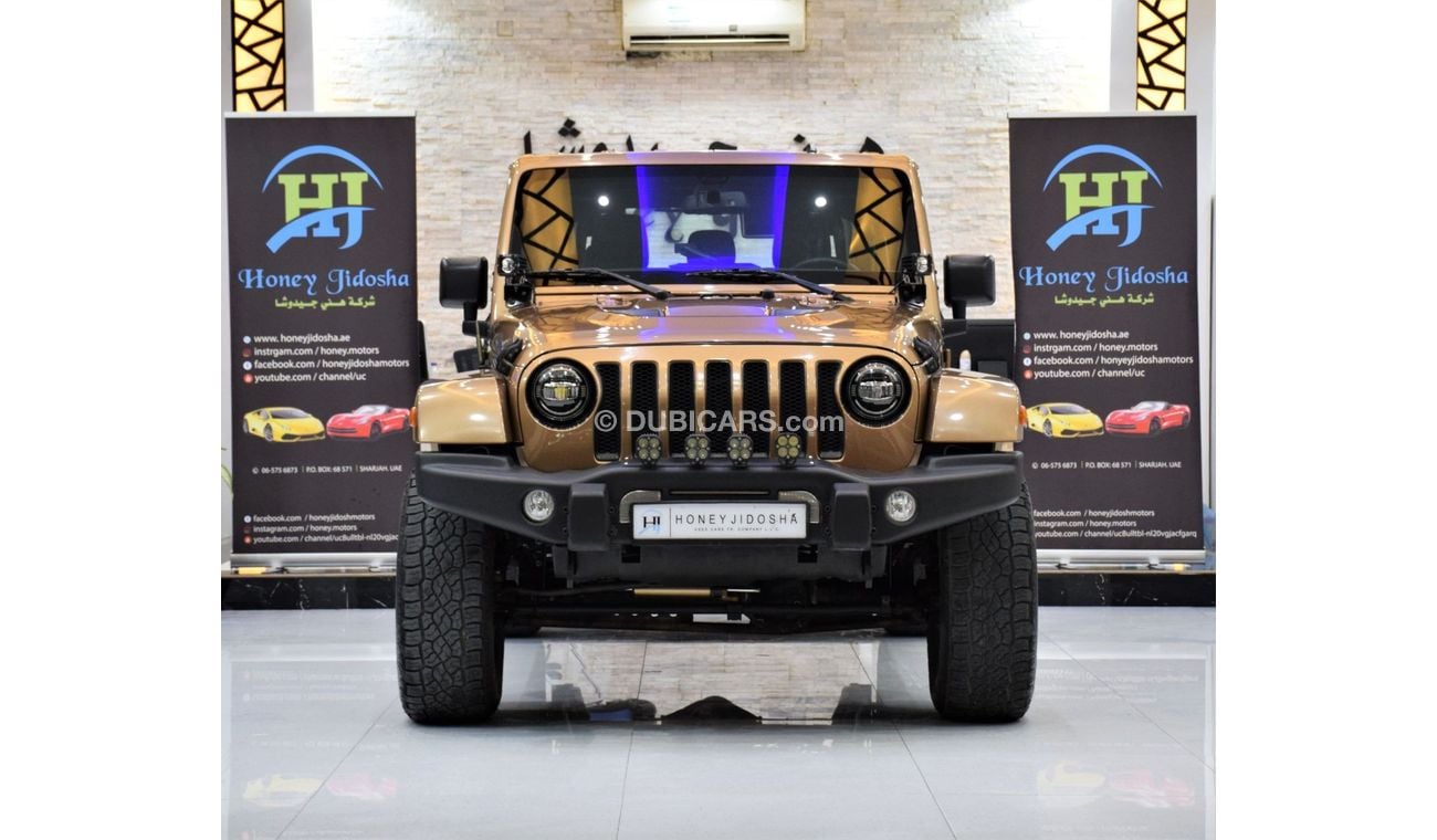 Jeep Wrangler Sahara EXCELLENT DEAL for our Jeep Wrangler UNLIMITED SAHARA 4x4 ( 2015 Model! ) in Brown Color! GCC