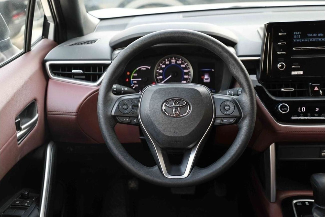 تويوتا كورولا كروس 2024 TOYOTA COROLLA CROSS 1.8 Hybrid MID - BLACK inside RED | Export Only