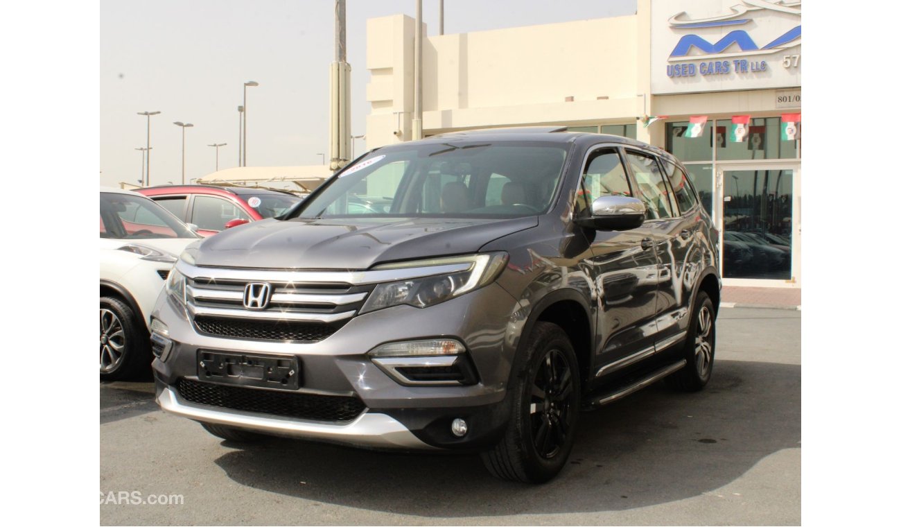 Honda Pilot Touring FULL OPTION  - GCC - EXCELLENT CONDITION INSIDE OUT - ACCIDENTS FREE