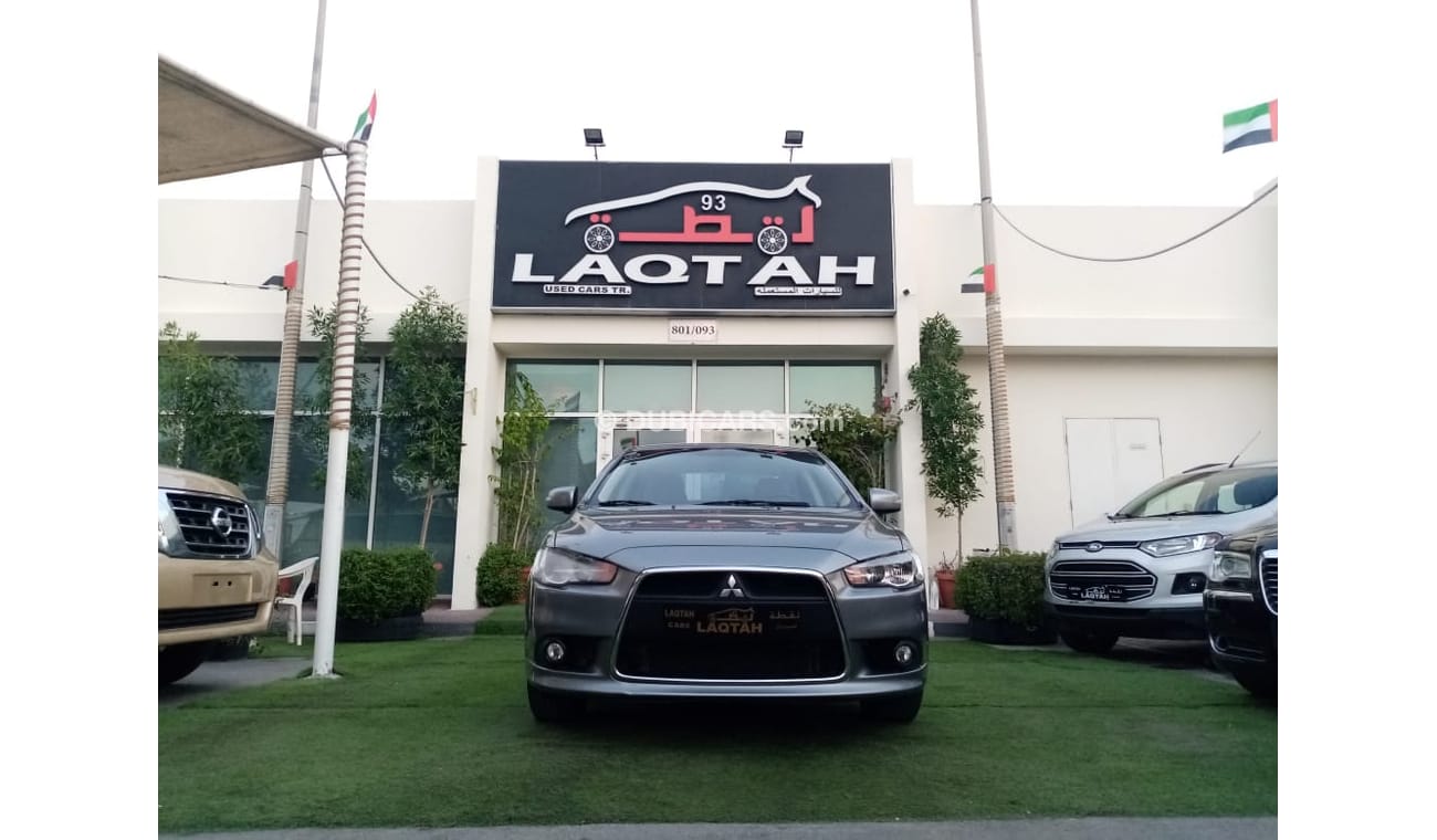 Mitsubishi Lancer Gulf gray color, inside beige without accidents, rear wing sensors, fog lights, in excellent conditi