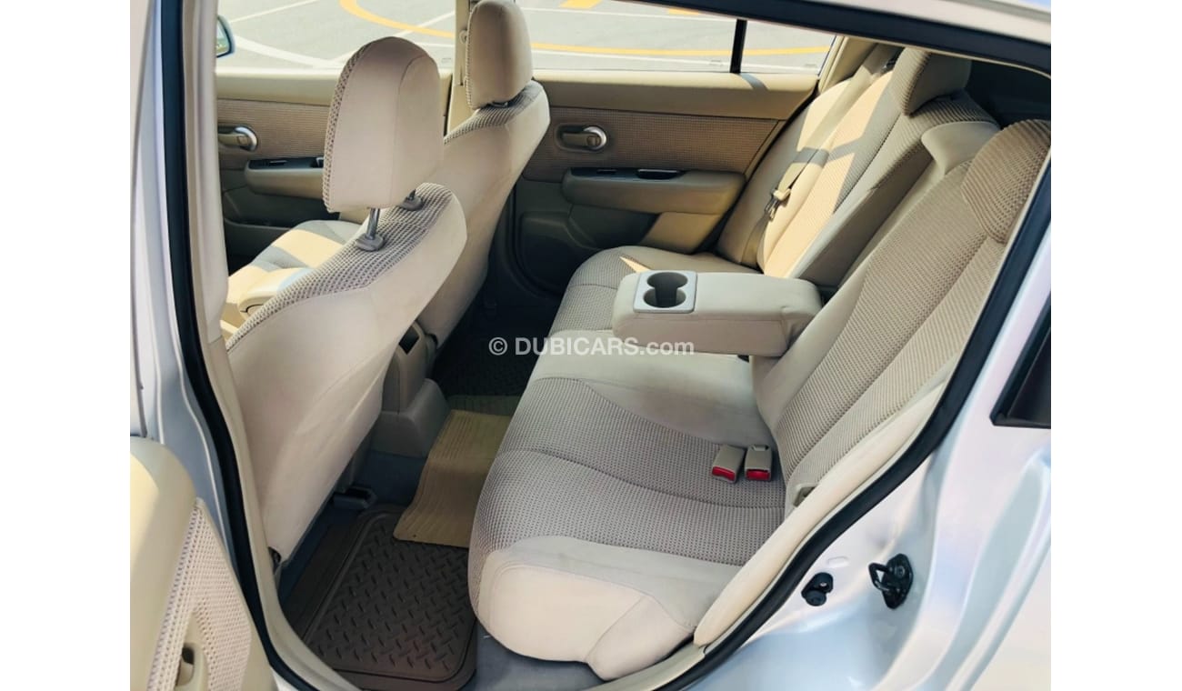 نيسان تيدا موديل 2012 خليجي فل مواصفات فتحه سقف مالك واحد من الوكاله مفتاحين فل مواصفات فتحه سقف