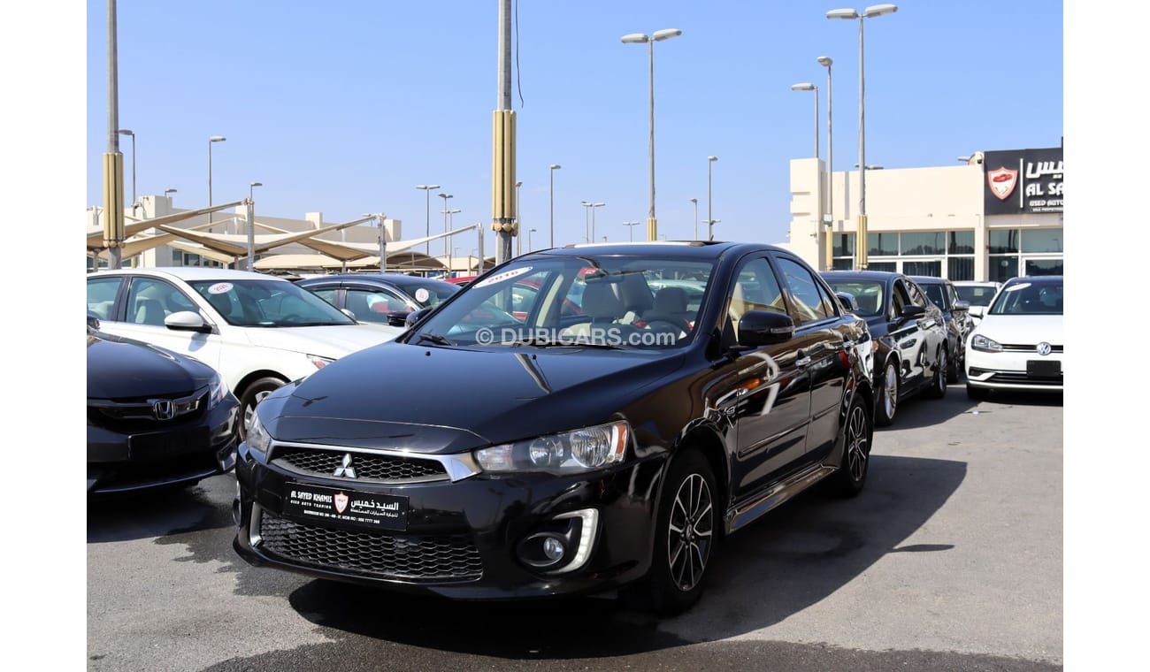 ميتسوبيشي لانسر GLS هاي خالية من الحوادث - خليجي - مكينة 2000 سي سي - رقم واحد - السيارة بحالة ممتازة من الداخل والخ