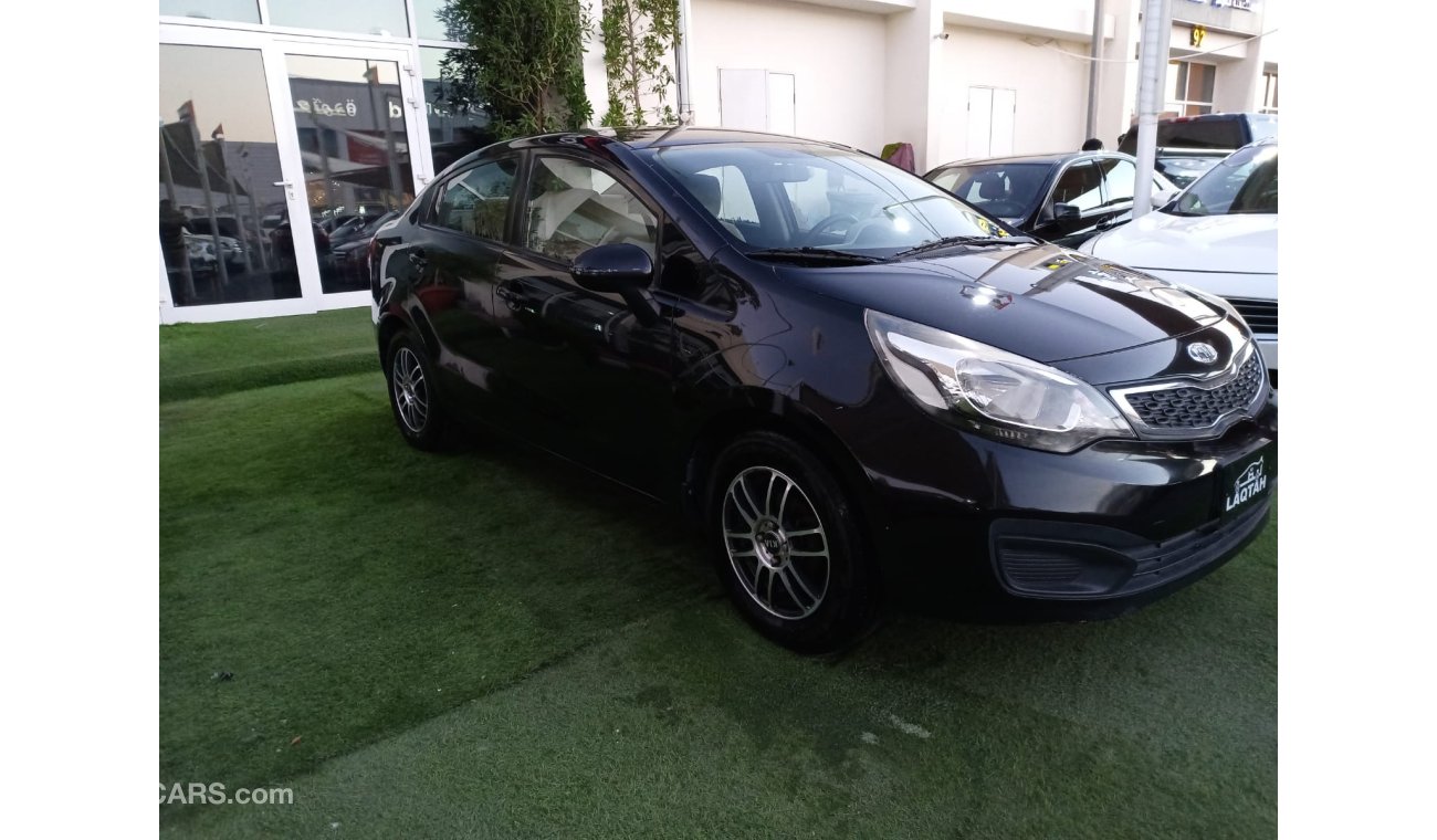 Kia Rio Gulf model 2013, black color, without accidents, wheels in excellent condition, you do not need any