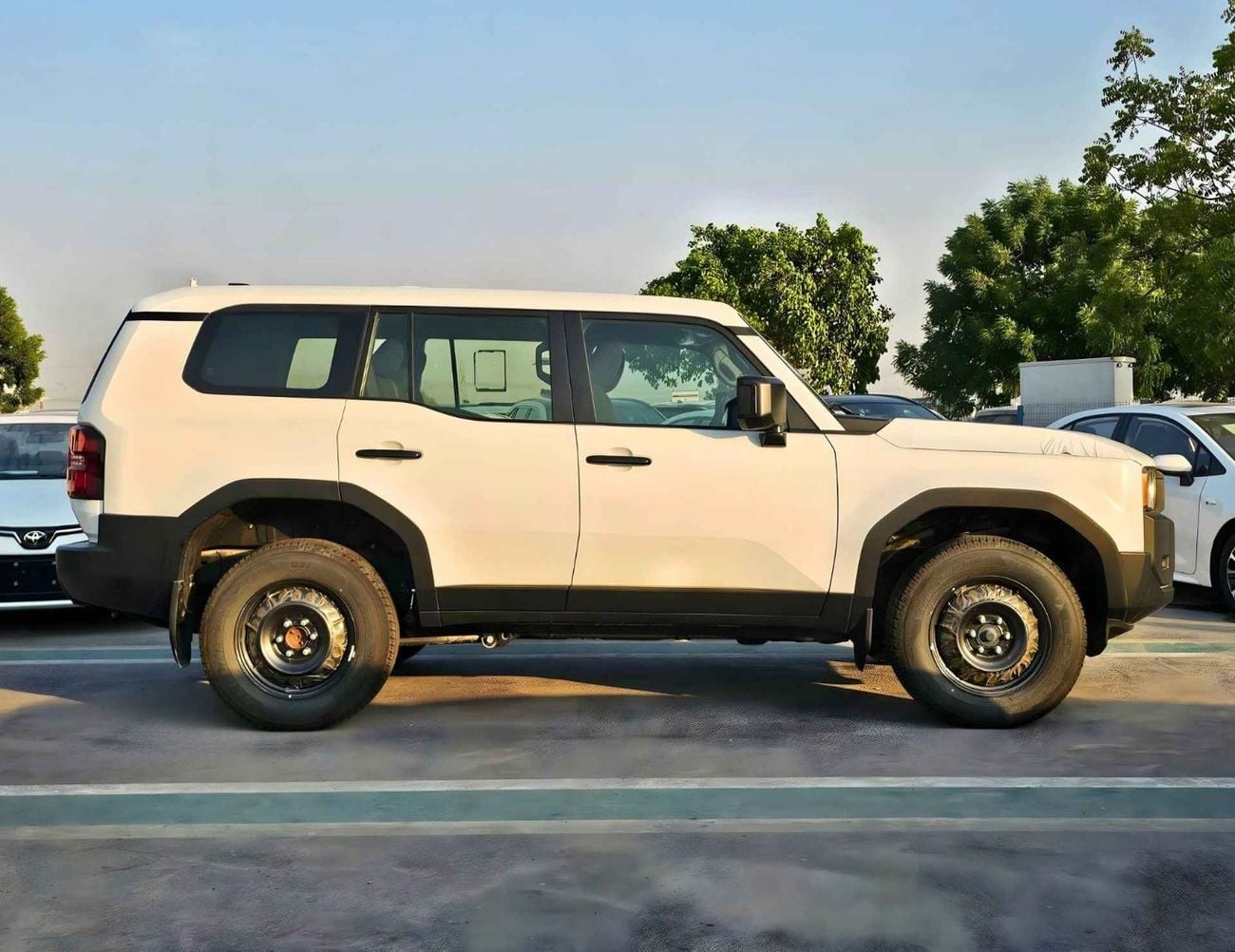Toyota Prado TX1 LC250 URBAN / 2.4L PETROL 4WD / DVD+CAMERA / COOL BOX / FABRIC SEATS (CODE # PR24U)