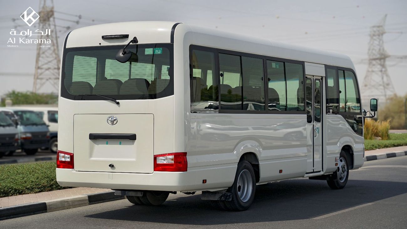 Toyota Coaster DLX - 23 Seater Bus with 4.2L Diesel Engine - Manual Transmission - AM/FM - Power Door