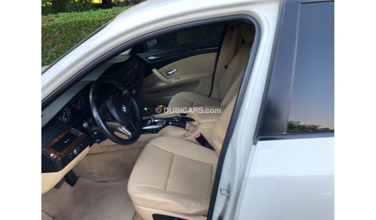 BMW 523i Model 2010 GCC car perfect condition inside and outside full option sun roof leather seats back came