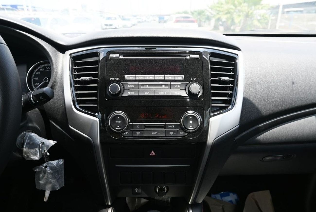 ميتسوبيشي L200 ميتسوبيشي L200 ديزل فل أوبشن أوتوماتيك 2.4 لتر أسود من الخارج أسود من الداخل