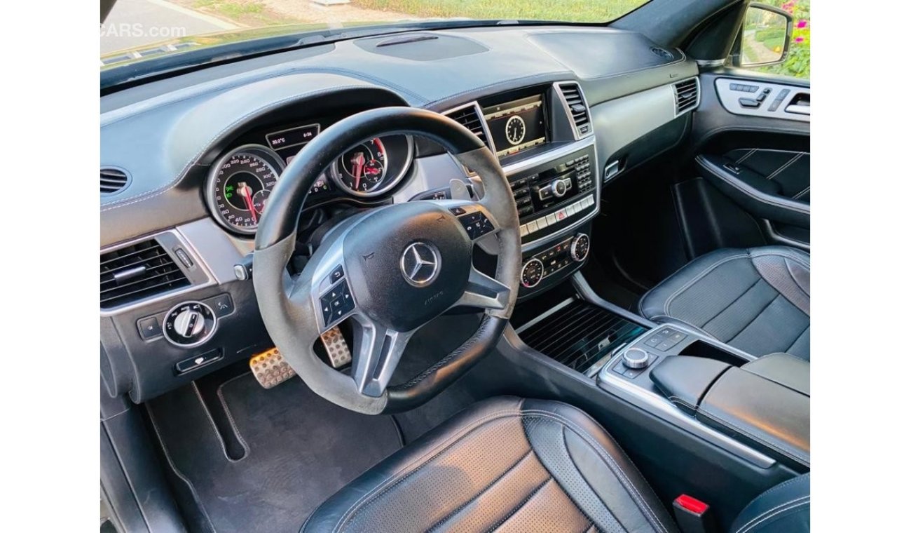 مرسيدس بنز ML 63 AMG Std مرسيدس بنز ML63 خليجي فل ابشن كاريون فايبر بحاله ممتازه